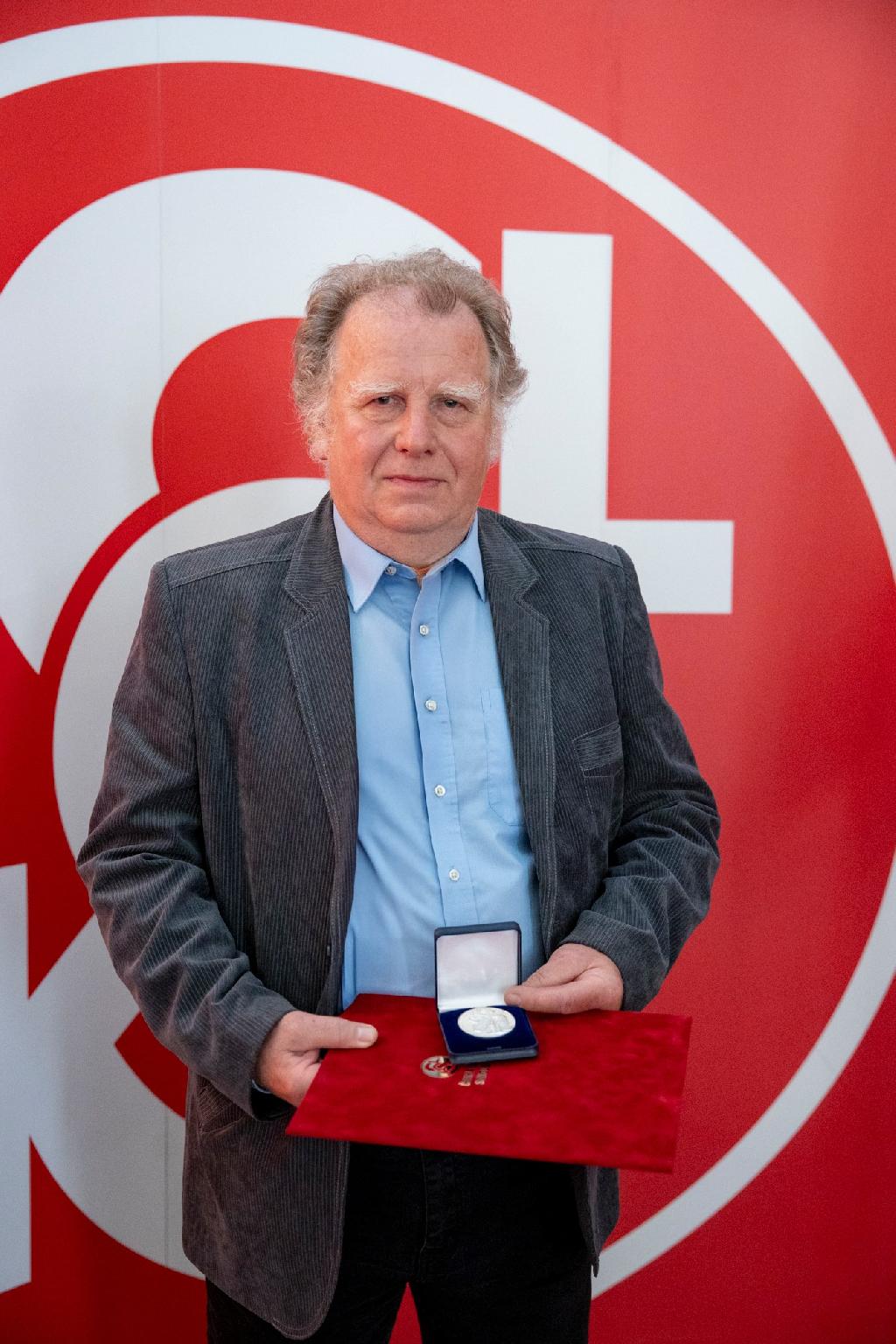 Václav Flodr, oceněný stříbrnou medailí ČOS