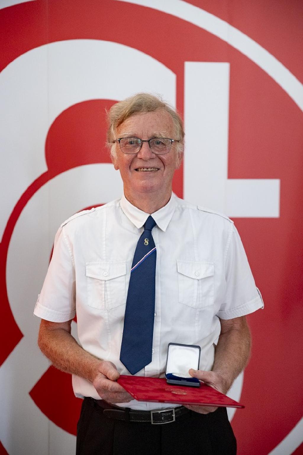 Vladimír Flodr, oceněný stříbrnou medailí ČOS